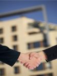 Businesspeople handshaking Stock Photo