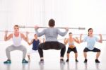 Diverse Group Of People Exercising In Gym Stock Photo