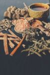 Dried Herbs And Ginseng, Top View Of Thai Herbs And Ginseng On Wooden Floor Stock Photo