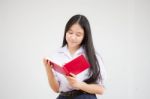 Asia Thai High School Student Uniform Beautiful Girl Read A Book Stock Photo