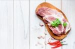 Raw Pork Tenderloin On A Cutting Board Ready To Cook Stock Photo