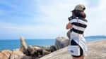 Woman Taking Photos At The Hin Ta Hin Yai Stock Photo