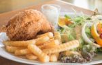 Deep Fried Chicken Meat With Organic Salad Stock Photo