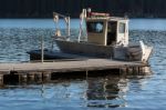 Boat On Placid Lake Stock Photo