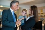 Businesswoman With Small Child In The Office Stock Photo