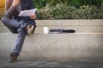 Looking For The Right Document. Confident Young Business Man In Stock Photo