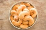 Cashew Nut Roast Salt On Weathered Wooden Table Stock Photo