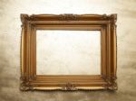 Old Picture Frame On Gold Wall Stock Photo