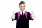 Bright Student Showing Thumbs Up Sign Stock Photo