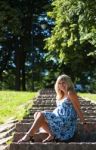 Beautiful Pregnant Woman In City Park Stock Photo