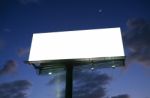 Billboard At Sunset With New Moon Stock Photo