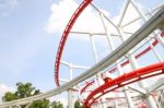 Curve Of Red And White Roller Coaster Rail Stock Photo