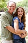 Aged Father Embracing His Daughter Stock Photo