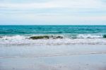 Sand Beach With Blue Ocean Stock Photo