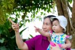 Mother And Daughter   In The Park Stock Photo