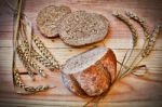 Fresh Bread On A Wooden Table Stock Photo