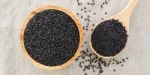 Black Sesame In Wood Bowl Background Stock Photo