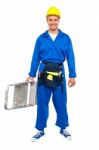 Worker Carrying Stepladder Stock Photo