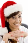 Smiling Girl Wearing Christmas Hat Stock Photo