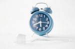 Alarm Clock And Toothbrush Stock Photo