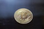 Bitcoin Curency Dof On Blue Light Background Stock Photo