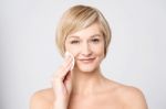 Image Of A Woman Cleaning Her Face Stock Photo