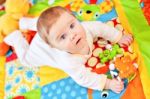 Infant Boy On Playmat Stock Photo