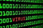 Close Up Of Binary Code Infected By Computer Virus Stock Photo