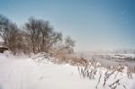 Winter Misty River. Snow And Frost. Overcast Snowy Weather Stock Photo