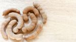 Sweet Ripe Tamarind Pods On Wood Background Stock Photo