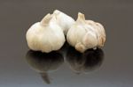 Three Garlic Bulbs Stock Photo