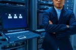 Man Fix Server Network In Data Center Room Stock Photo