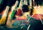 Artist Paint Brush On Painting Background  Stock Photo