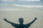 Shadow Man On Beach Stock Photo