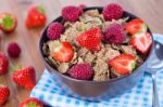 Bran Flakes With Fresh Raspberries And Strawberries Stock Photo