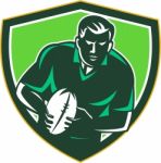 Rugby Player Running Passing Ball Crest Retro Stock Photo