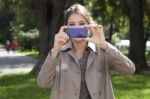 Woman Photographing With Mobile Phone Stock Photo