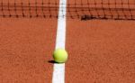 Tennis Ball On Court Stock Photo