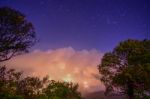 Night Sky And The Sea Fog At Night On The Mountain In Chiang Mai Stock Photo