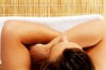 Man Relaxing In A Spa Resort On Mat Stock Photo