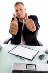 Smiling Manager Shows Approval Sign Stock Photo