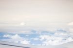 Cloudy Sky View From Airplane Cabin Window Stock Photo