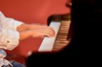 Boy Plays Piano Stock Photo