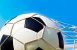 Soccer Ball In Net Stock Photo