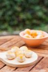 Mini Chinese Cakes On Wooden Plate Stock Photo