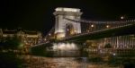 Chain Bridge Illuminated At Night In Budapest Stock Photo