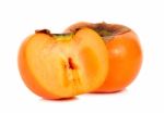 Persimmon On White Background Stock Photo