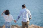 Couples Of Younger Man And Woman In Love Relaxing Vacation Outdoor Lifestyle Stock Photo