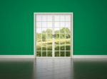 White Rrom Door On Green Wall Background Stock Photo