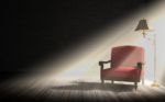 Living Room Interior, Red Armchair And Classic Floor Lamp In Dark Room With Sunlight Rays Stock Photo